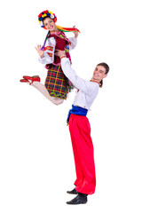 beautiful dancing couple in ukrainian polish national traditional costume clothes jumping, full length portrait isolated