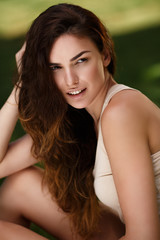 Natural portrait of a beautiful girl with pure skin outdoors