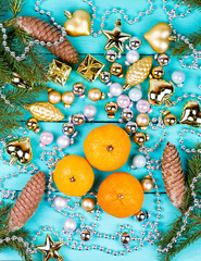 Tangerines and baubles on a table