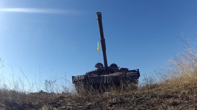 Tank goes directly to the camera. Military armored vehicles training