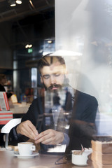 hipster businessman on break for a coffee