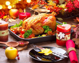 Christmas Dinner. Roasted turkey garnished with potato, vegetables and cranberries