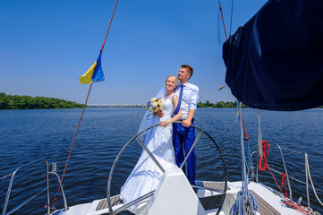 Wedding couple on yacht