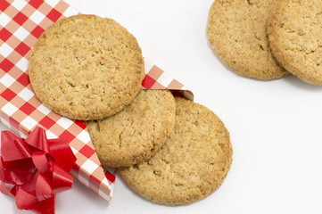 Integral cookies in a decorated box on white background