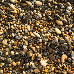 Sea pebbles beach texture.