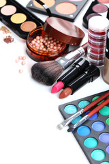 Obraz na płótnie Canvas Makeup brush and cosmetics on a white background