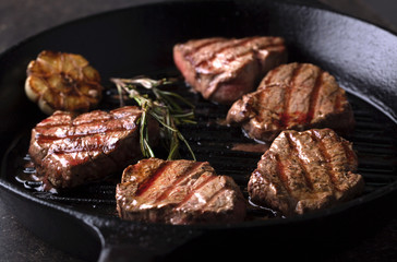 Grilled beef medallions on the grill pan