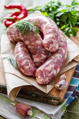 Raw sausages  with herbs and spices