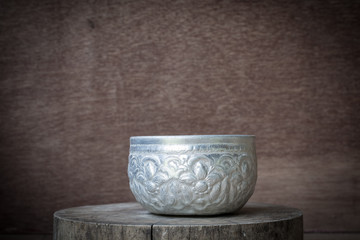 Still life-Cup water drink old thai style retro on wooden backgr