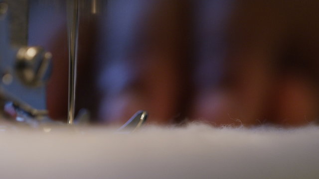 4K Close up of sewing machine needle stitching, shot on Red Epic Dragon
