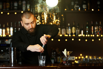 Bartender making cocktail