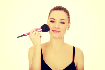 Beautiful spa woman with brush.