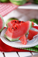 Sliced watermelon on plate closeup