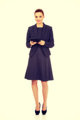 Business woman with tablet.
