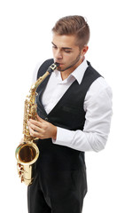 Obraz premium Happy saxophonist plays music on sax in elegant suit on white background