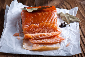 smoked salmon filet on wooden board