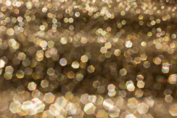 Beautiful romantic bright and glow bokeh abstract shining golden colour background