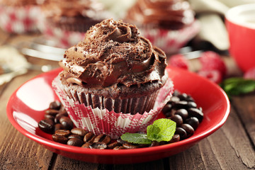Chocolate cupcakes on saucer closeup