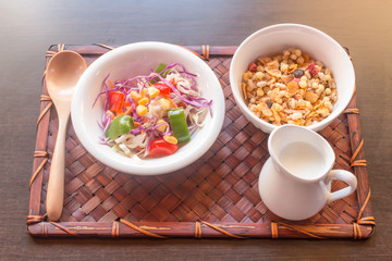 salad  cereal  and mailk   healthy breakfast in bamboo trays