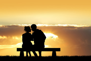 Obraz premium couple kissing on bench