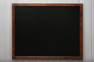 Blank old blackboard on the wall
