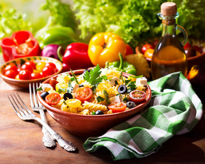 bowl of pasta salad with vegetables