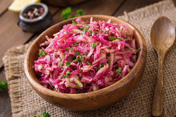 Pink daikon salad with apples, pickled onions and parsley
