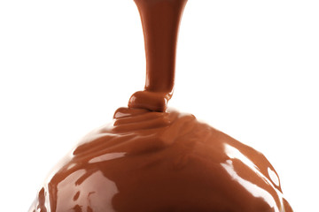 Delicious cupcake with melted chocolate topping, isolated on white, close-up