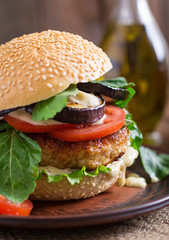 Juicy spicy chicken burgers with tomato and eggplant - sandwich.