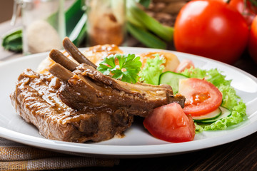 Pork spareribs served with silesian noodles and sauce