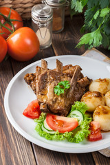 Pork spareribs served with silesian noodles and sauce