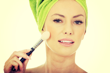 Beauty woman with makeup brush.