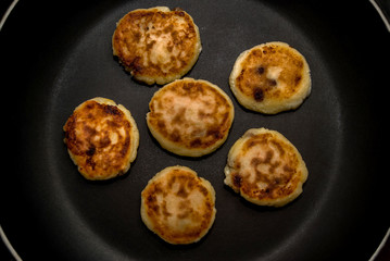 cheese pancakes in a pan