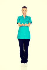 Fototapeta premium Doctor woman hand showing something on palms.