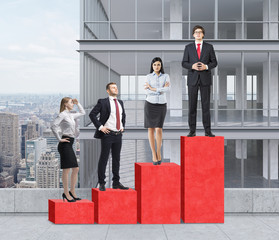 Stairs as a huge red bar chart are on the roof. Business people are standing on each step as a...