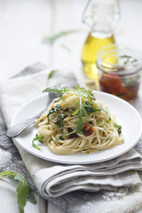 Arugula and sundried tomatoes pasta