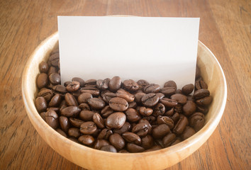 Roasted coffee bean and business card