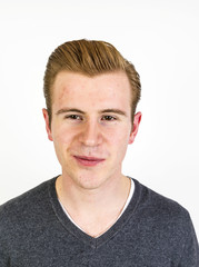 Obraz premium portrait of cute teenage boy with red hair