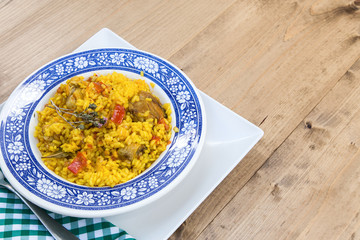 Rice with chicken and vegetables in bowl