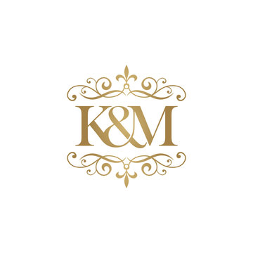 K&M Initial logo. Ornament ampersand monogram golden logo