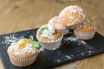 Homemade muffins with star anise, cinnamon and mint