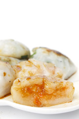 steamed chives dumplings isolated on white background (can stuffed with garlic chives or taro or yam bean mixed with small shrimp)