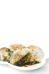 steamed chives dumplings isolated on white background (can stuffed with garlic chives or taro or yam bean mixed with small shrimp)