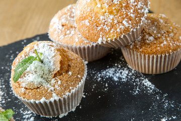 Homemade muffins with star anise, cinnamon and mint