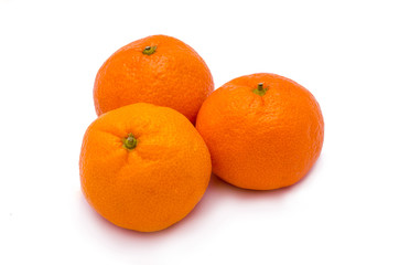 Three mandarins isolated on white background