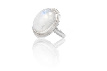 Silver ring with moonstone isolated on white background - obrazy, fototapety, plakaty