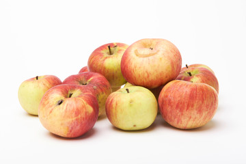 Biological natural apples isolated on white background. Grown without fertilizers and chemistry.