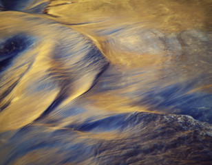 blurred autumn water level of the river