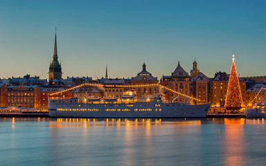 Stockholm city with Christmas tree and light decorations at night.