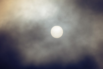 Full Sun behind heavy Fog black and white